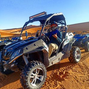 Buggy on the top of sand dunes